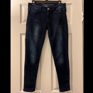 Dark Blue Distressed Super Low Jeggings from American Eagle